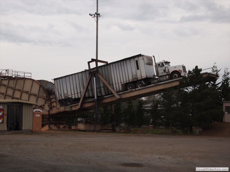 Truck being raised to empty at the fuel dump station